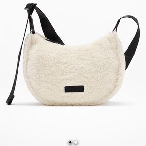 Athleta Cream Sherpa Crossbody crescent Bag with Black Strap NWT